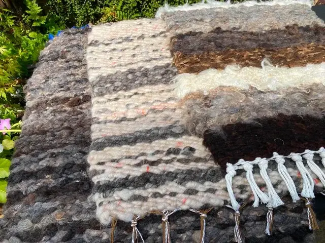 Hand-woven wool textile by Shirley Ball